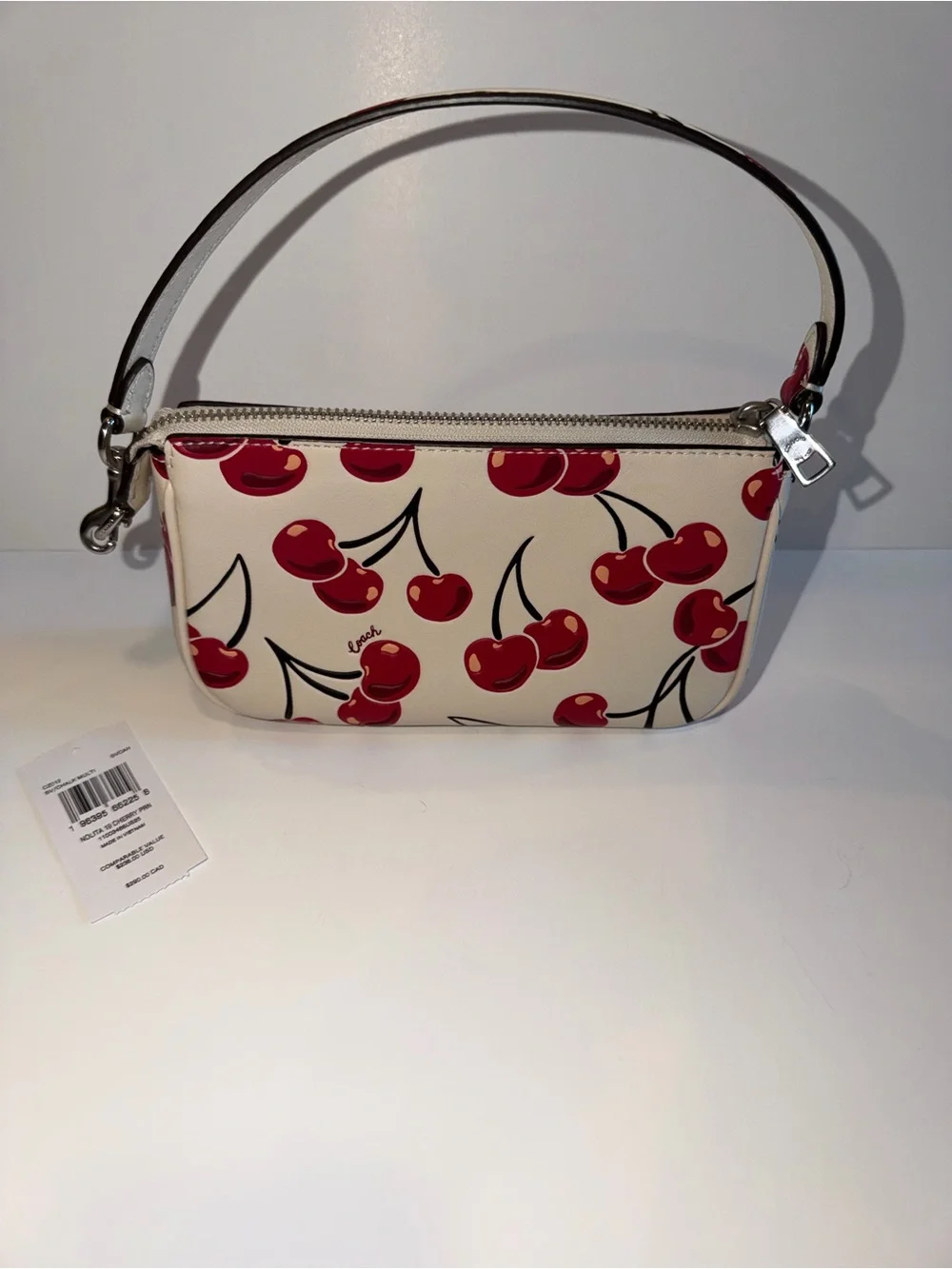 COACH New Cream Leather Small Wristlet with Red Cherry Print